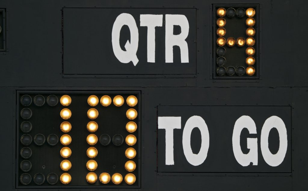 Scoreboard on American Football field yards to go and QTR - Springs Church